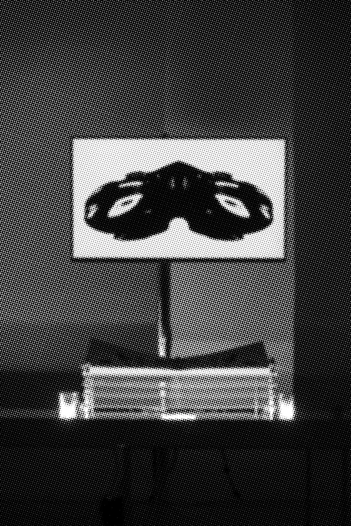 Another frame from the display: a symmetrical blot form rendered in dither, held in a bright rectangle above the lit base of the cabinet.